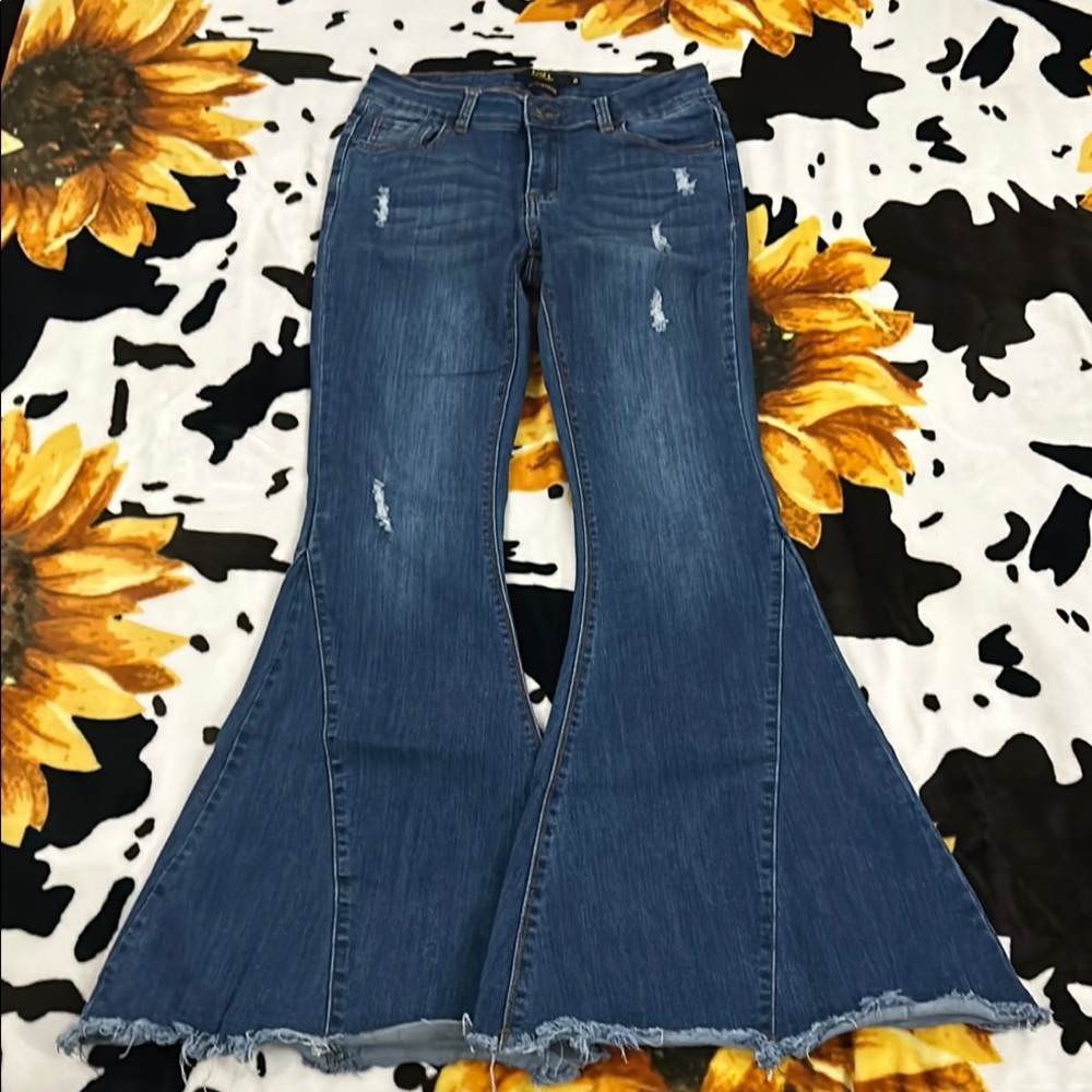 Mid RiseDistressed Flare Jeans